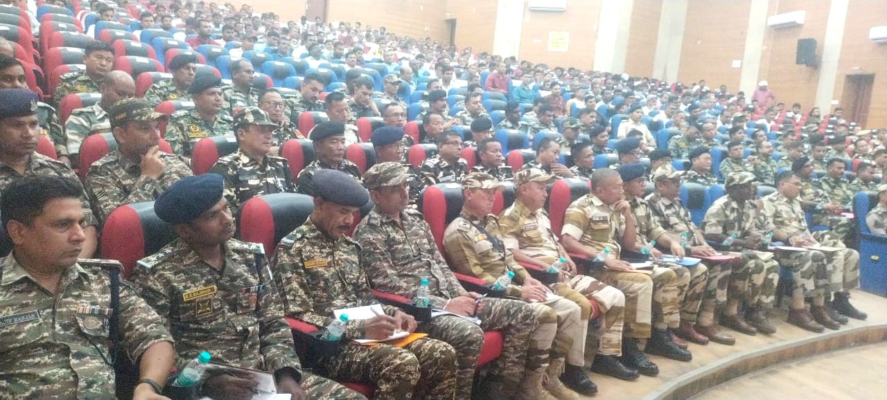 Military personnel attending a conference.